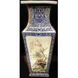 A large contemporary Chinese tapered square vase, flared neck, decorated with fanciful birds amongst