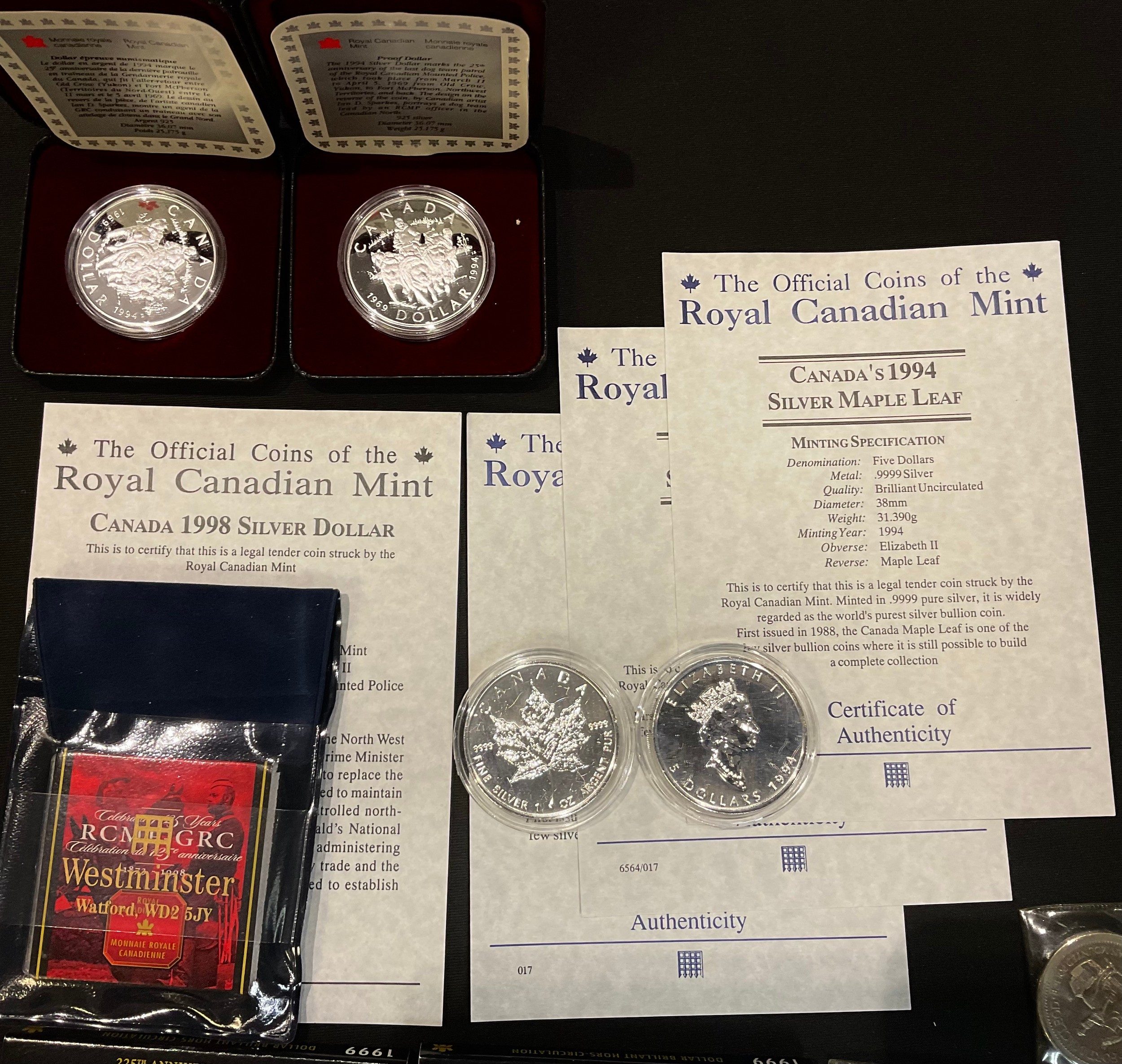 Canadian coins: two silver $1 Maple Leaf 1994 BU; Silver $1 Royal Canadian Mounted Police 1998, BU - Image 2 of 2