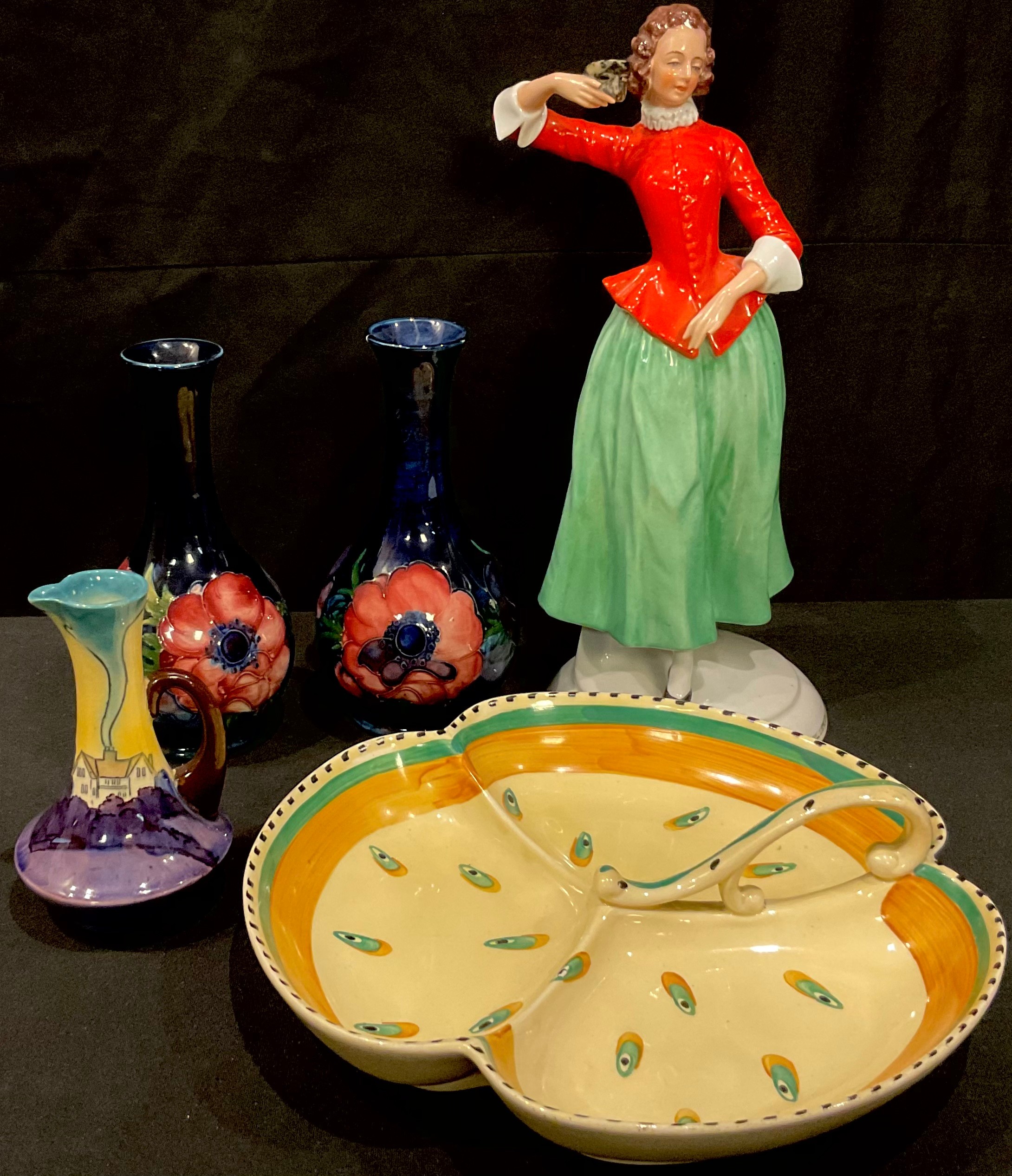 A pair of Moorcroft Anemone pattern vases; a Continental figure, the Masquerade; a Foley Pastello