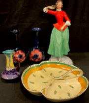 A pair of Moorcroft Anemone pattern vases; a Continental figure, the Masquerade; a Foley Pastello