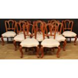 A set of ten dining chairs, shaped and pierced backs carved with scrolls, cabriole forelegs, 92cm