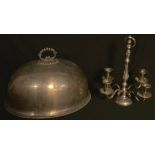 A large 19th century plated meat dome, 47cm wide, c.1880; a four light table candleabrum (2)