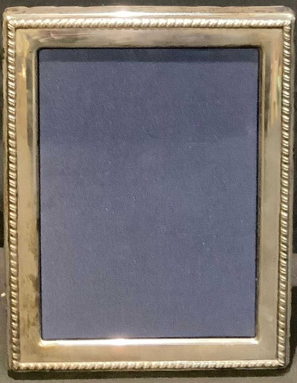 An Elizabeth II silver rectangular easel photograph frame, 22cm x 17cm, Sheffield 2001