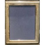 An Elizabeth II silver rectangular easel photograph frame, 22cm x 17cm, Sheffield 2001