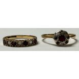 A 9ct gold diamond and ruby chip half eternity ring, size I, a 9ct gold flower head diamond and ruby