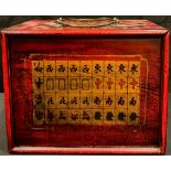 A Chinese mahjong set, cased