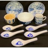 An 18th century Chinese blue and white coffee cup; two saucers; rice spoons; etc (10)