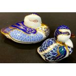 A Royal Crown Derby paperweight, Duck, gold stopper; another, Sitting Duckling, gold stopper (2)