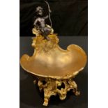 A French Empire style reproduction gilt brass table centre, the scallop shaped dish surmounted