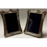 A pair of silver photograph frames, Birmingham 1924, 17.5cm high