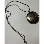 A hallmarked silver compact, on neckchain, Birmingham 1919