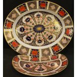 A Royal Crown Derby Imari palette 1128 pattern oval serving plate,33cm, first quality; an 1128