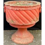 A 20th century spirally fluted concrete pedestal garden urn, 43cm diam, 45cm high **Please note that