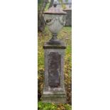 A fluted garden urn and pedestal, 145cm high overall **Please note that some of the lots in this