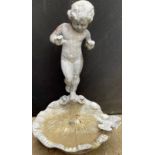 A 19th century lead figural fountain, as a putti standing on a shell, with bird, 72cm high **