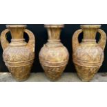 A pair of large composite two handled garden amphoras, in relief with stylised leaves, sprayed gold,