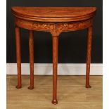 A 19th century marquetry demilune triple-top games table, hinged top enclosing a parquetry game