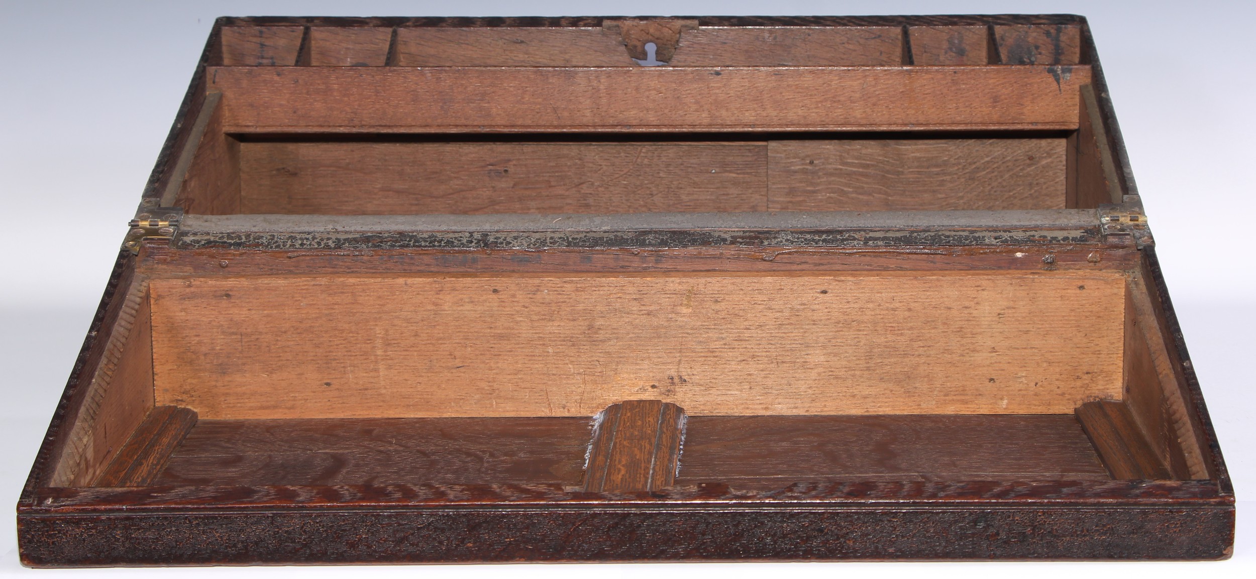 A large 19th century oak writing box, incorporating earlier panels, hinged cover inlaid in holly and - Image 3 of 4