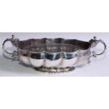 An Edwardian silver lobed oval pedestal table jardiniere, beaded divided scroll handles