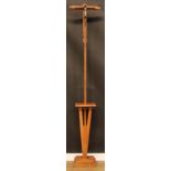 An Arts & Crafts period oak processional cross and sanctuary stand, 219.5cm high overall, the Corpus