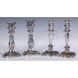 A pair of George/William IV Old Sheffield Plate table candlesticks, waisted campana sconces,