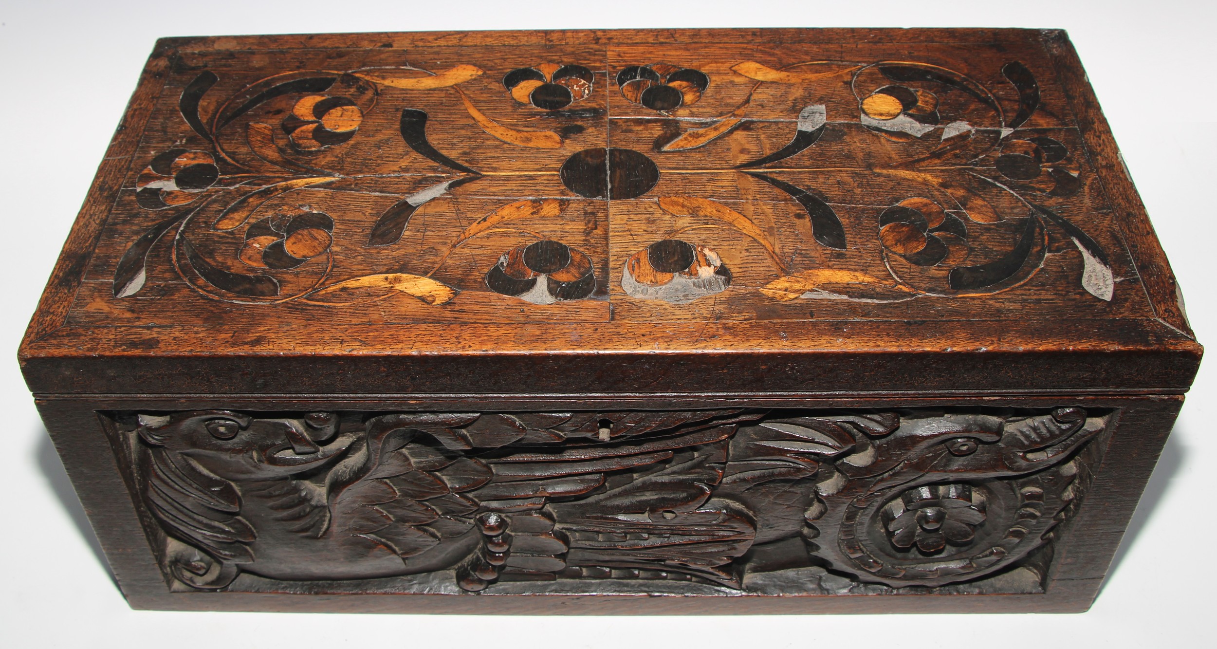 A large 19th century oak writing box, incorporating earlier panels, hinged cover inlaid in holly and - Image 2 of 4