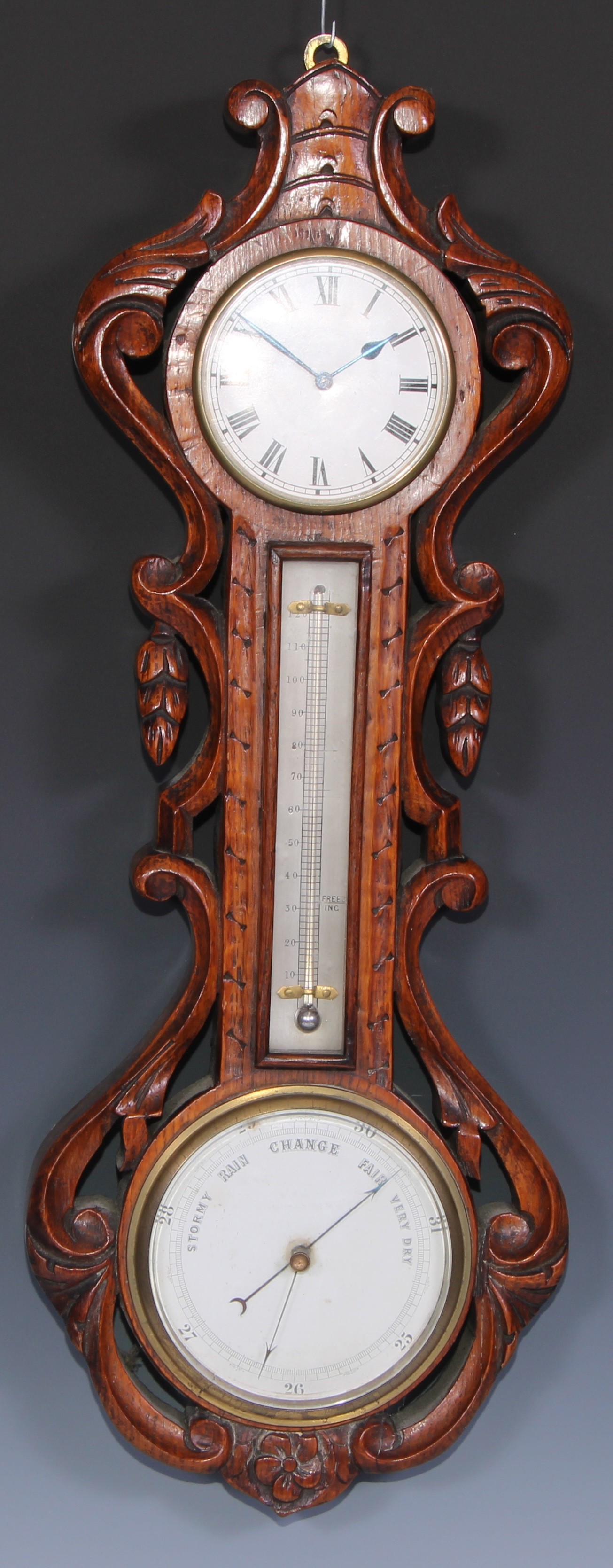 A Victorian oak combination wall timepiece, barometer and thermometer, 9cm clock dial inscribed with