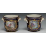 A pair of French Sevres-type cache pots, painted with oval cartouches of courting couples, the verso