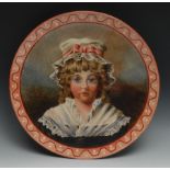 A Pinder Bourne & Co Burslem circular charger, painted with a young girl wearing a lace cap tied