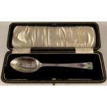 An Art Deco silver and enamel christening spoon, the terminal decorated in polychrome with Humpty