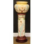 An Art Nouveau majolica ovoid jardiniere and pedestal, moulded in relief and brightly glazed with