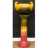 A large Egyptianesque jardiniere and pedestal, possibly designed by Christopher Dresser for Ault