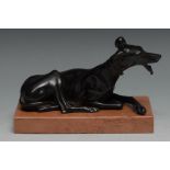 French School (19th century), a dark patinated bronze, of a dog, the recumbent greyhound with