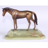 An Art Deco period cold painted bronze, of a horse, green onyx base, 21.5cm long overall, c.1940