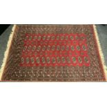 A Turkman style hand-knotted Persian rug / carpet, the central field with all-over medallion