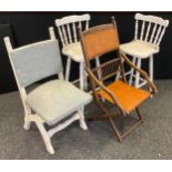 An early 20th century folding steamer/deck chair, pair of painted pine bar stools etc (4)