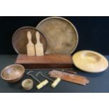 A 19th century mahogany rectangular box; turned wooden bowls; boot pulls; cribbage board; butter