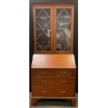 A 19th century satinwood bureau bookcase, the interior with shell patera, 203cm high, 84cm wide