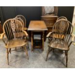 A set of six wheel back dining chairs; a drop leaf table; a Jaycee corner cabinet (8)