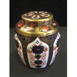 A Royal Crown Derby 1128 ginger jar and cover, 10cm high, printed mark