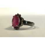 A dark vintage finish ruby and diamond ring, 3.2ct, natural oval stone, silver mount