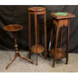 A 19th century oak wine table, circular top, turned column, tripod feet, 67cm high, 28cm diameter;