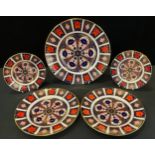 A Royal Crown Derby 1128 pattern dinner plate, printed marks; two similar dessert plates; two side