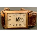 A Gentleman's 9ct gold wristwatch, rectangular case, Arabic numerals, leather strap