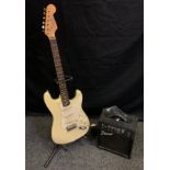 A Liberty 303 Stratocaster style electric guitar, with stand; a Prime RG-10 amplifier