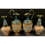 A pair of Doulton Lambeth Chine ware bulbous vases, 23cm high, an pair of similar ewers 29cm high (