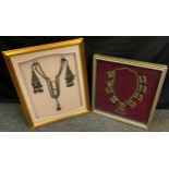 Tribal At - an Egyptian metal necklace, framed; another (2)