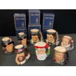 A Royce Wood character jug, Elvis, printed mark; another; others, smaller, Town Crier, Santa;