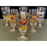 A set of six lemonade glasses, each prints in colour with a polo player, 17cm high