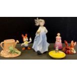 A Royal Doulton figure, Bridesmaid, M30; a Sylvac spill vase, with a gnome, 2277; a Wade Panda